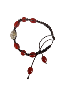 Bracelet en cordelette marron avec six perles de la mme couleur et une croix
