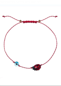 Bracelet grec du 1er mars martaki avec une petite coccinelle et un il bleu